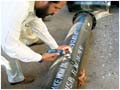 Testing thickness of pipe